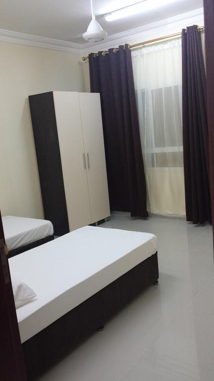 Golden Seasons Furnished Apartment サラーラ 部屋 写真