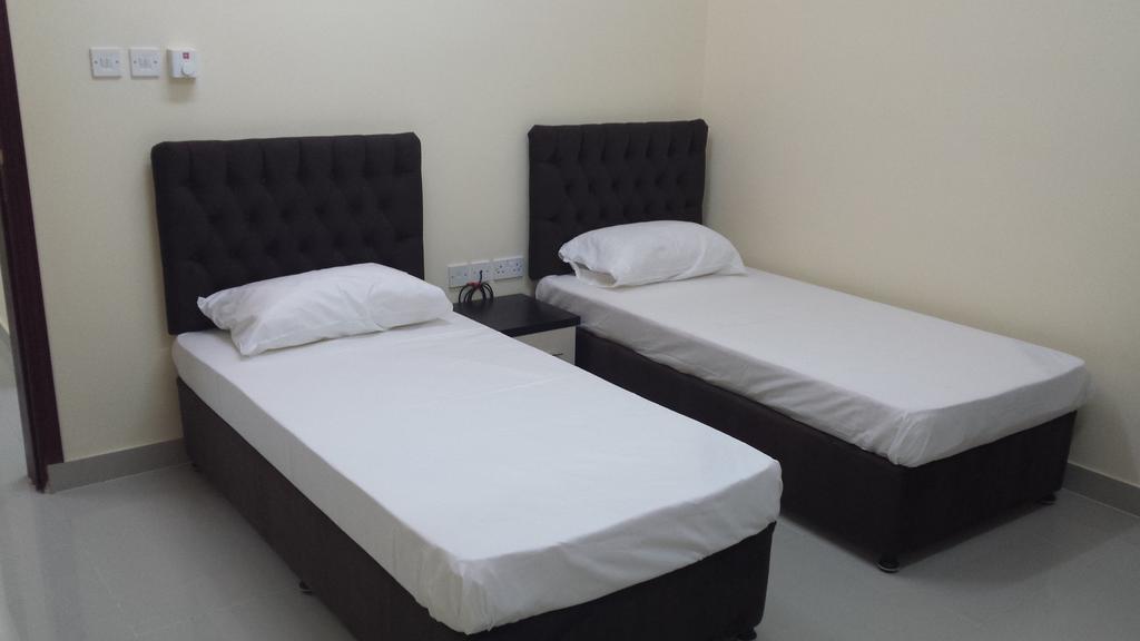 Golden Seasons Furnished Apartment サラーラ 部屋 写真